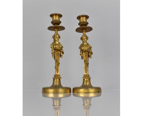 A Pair of French Gilt Bronze Candlesticks, The Supports having Drip Trays Surmounting Classical Maiden Busts in Tapering Plin