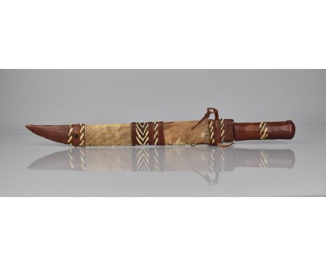 A Leather Handled Machete with Animal Skin Scabbard, Possibly African Tribal 