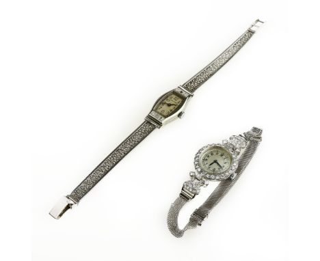 Two Diamond-set cocktail watchesComprising: an early 20th century example, with champagne-coloured circular dial, with arabic