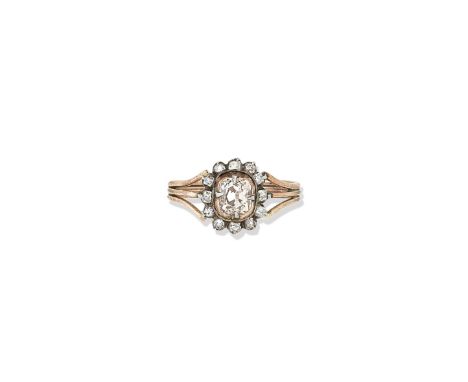 A diamond cluster ring, late GeorgianWith central claw and rubover-set old round brilliant-cut diamond, estimated weight appr