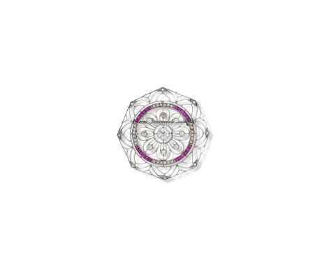 A ruby and diamond brooch, EdwardianOf octagonal open form with stylised florette set with old brilliant-cut diamonds, within