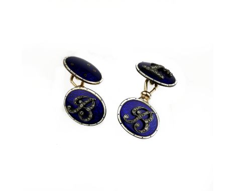 A pair of enamel and diamond oval cufflinksMonogramed with 'B' and a crested motif, embellished with old brilliant-cut and ro