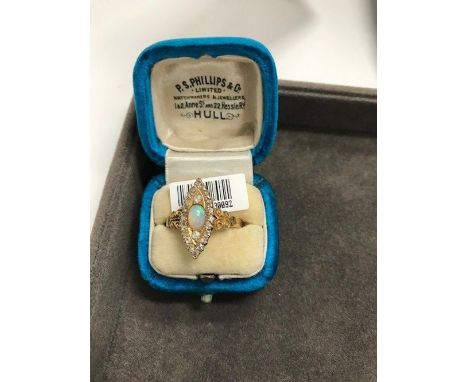 An opal and diamond plaque ring, EdwardianWith central oval cabochon-cut opal, surrounded by old brilliant-cut and single-cut