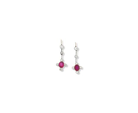 A pair of synthetic ruby and diamond pendent earrings, early 20th centuryEach comprising a millegrain rubover-set oval-cut sy
