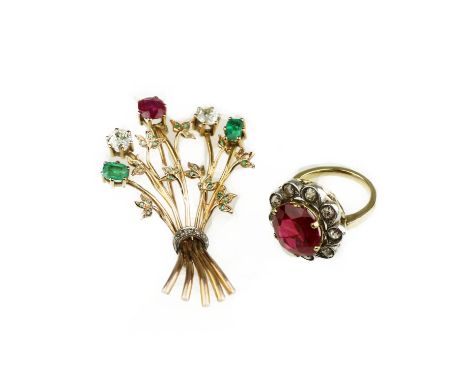 A gem-set brooch and a synthetic ruby and diamond cocktail ringThe foliate spray brooch, set with diamonds, emeralds and a ru