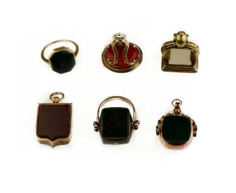 Five assorted hardstone fobs and a ringComprising: a shield-shaped locket/fob, set with bloodstone and carnelian; two similar