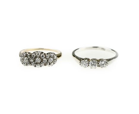 Two diamond set ringsComprising: a triple cluster ring, set with graduated old round brilliant-cut diamonds, to a plain hoop,