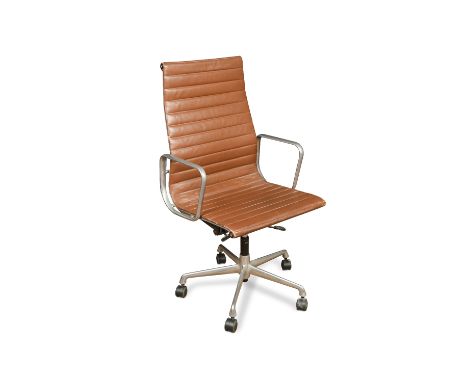 After Charles &amp; Ray Eames, an Aluminium group high-back swivel armchair by Vitra, the height adjustable chair in cognac l