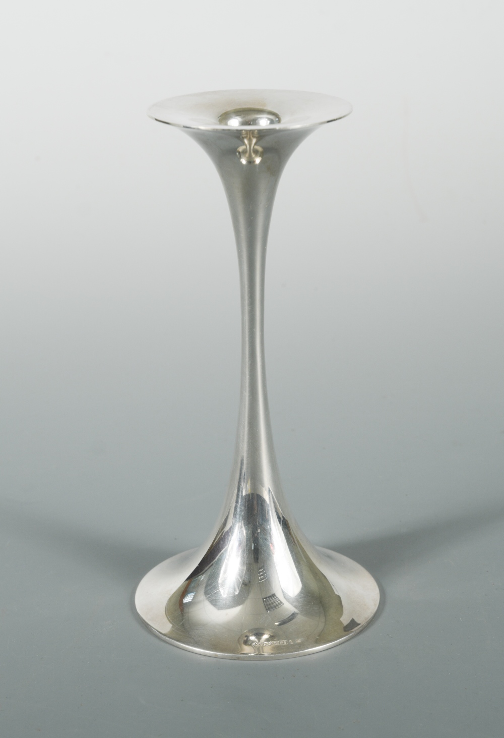 Tapio Wirkkala (Finnish, 1915–1985), a Finnish metalwares candlestick, with  flaring rim and foot, in - Cheffins Fine Art