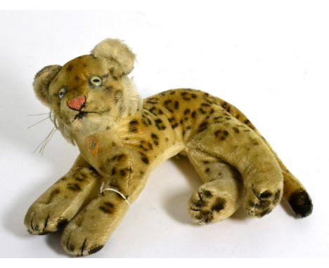 A Steiff model of a leopard, with original paper tag, with illuminated eyes 