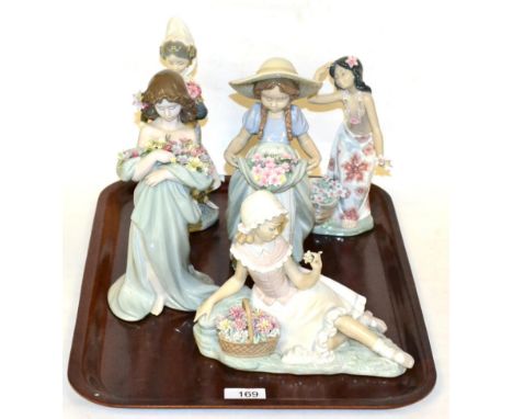 Five Lladro figures including Petals of Love no. 6346, Valencian Lady no. 1304, Bountiful Blossoms no. 6756, Hawaiian Dancer 