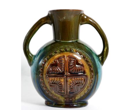 A Linthorpe pottery lustre glazed twin handled vase by Christopher Dresser, no. 337, impressed signature to base