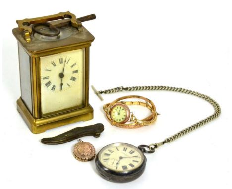 A 22ct gold band ring (a.f.), a 9ct gold bangle, a 9ct gold lady's wristwatch, a Victorian yellow metal locket, a silver pock