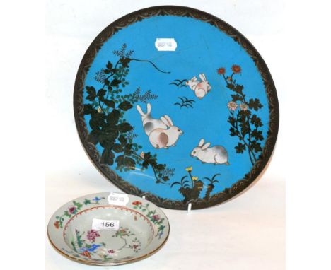 An 18th century Chinese dish with enamel decoration of flowers, together with a cloisonne plate decorated with rabbits