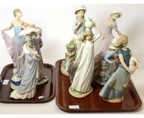 Three Lladro figures together with five Nao figures 