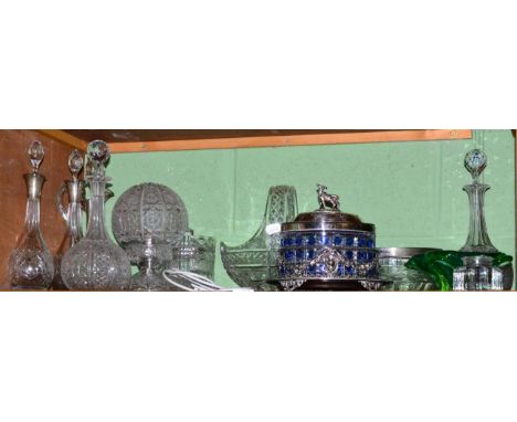 A collection of 19th century and later glass including a pair of silver mounted decanters, cut glass table lamp, a blue flash