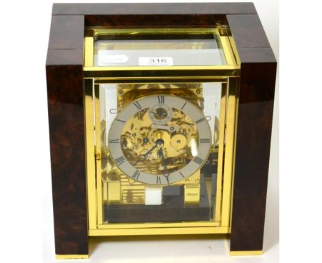 A faux burr walnut modern chiming table clock, signed Kieninger 