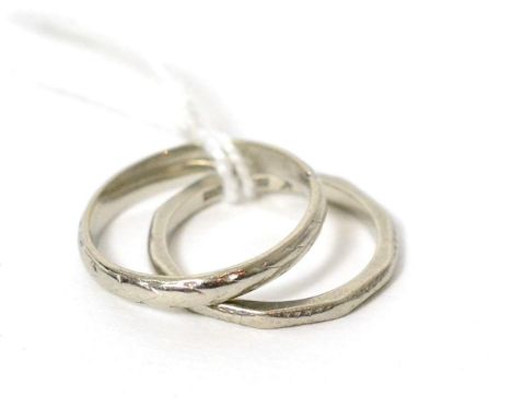 Two band rings, stamped PLATINUM, finger size K and L1/25.8g gross