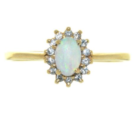 AN OPAL AND DIAMOND RING, IN GOLD MARKED 14K, 2G, SIZE T½++LIGHT WEAR CONSISTENT WITH AGE