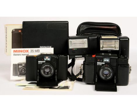 TWO MINOX 35GT FOLDING CAMERAS, LEATHER CASE OR BOXED AND TWO MINOX FLASH GUNS