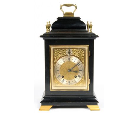 A GERMAN BRASS MOUNTED AND EBONISED BRACKET CLOCK, THE L FURTWANGLER MOVEMENT STRIKING ON TWO COILED WIRE GONGS, 36CM H EXCLU