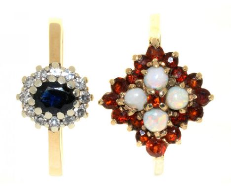 TWO RINGS, ONE WITH OPAL AND GARNETS IN 9CT GOLD, LONDON 1979, SIZE R, THE OTHER WITH DIAMOND AND SAPPHIRES IN 9CT GOLD, LOND