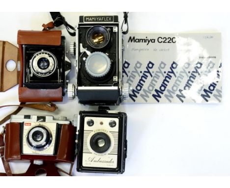 A KODAK COLOURSNAP 35 CAMERA, LEATHER CASE, AN ENSIGN SELFIX 1620 FOLDING CAMERA, LEATHER CASE, A MAMIYAFLEX TWIN LENS REFLEX