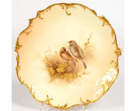 A ROYAL WORCESTER MOULDED PLATE, PAINTED WITH TWO BIRDS ON A RAISED GILT PRUNUS BOUGH, 20CM D, PUCE PRINTED MARK, RED PAINTED