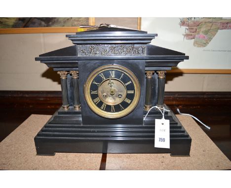A 19th Century mantel clock in architectural style polished black slate case with decorative metal columns, the circular Roma