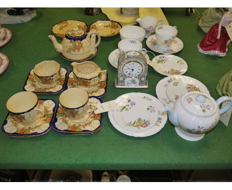 A Shelley 'Wild Flowers' pattern twelve-piece tea-for-two tea set, comprising: teapot, sugar and cream, two cups, two saucers