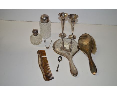 A silver backed dressing table set, items to include: a hand mirror, comb and hand brush; a cut glass sugar caster; a scent b