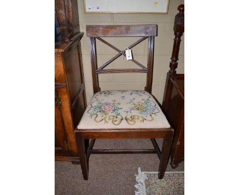 A single Georgian mahogany dining chair, with curved inlaid cresting rail and reeded supports, the drop-in seat fitted in tap