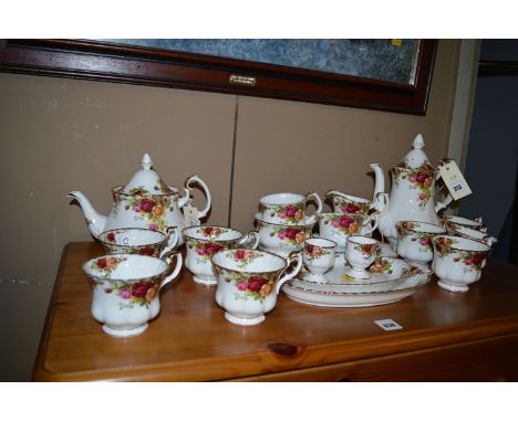 A Royal Albert 'Old Country Roses' pattern part dinner, tea, and breakfast service; and four decorative plates various.