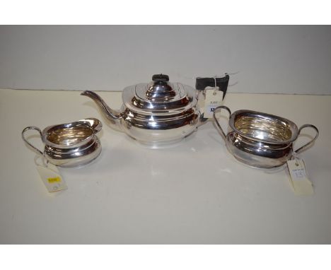 A three-piece silver tea service by Edward Viners, Sheffield 1961, of plain oval form. 39oz.