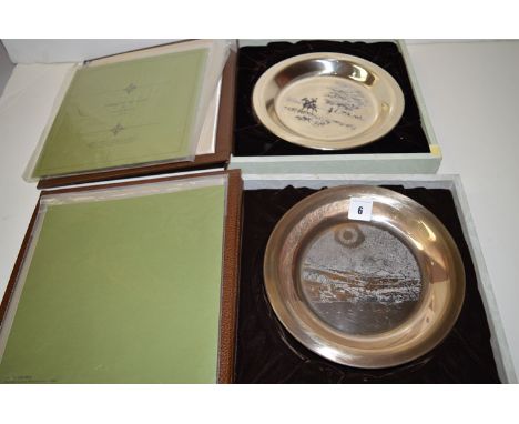 Two silver decorative plates, decorated by James Wyeth for The Franklin Mint, 1973, including "Winter Fox" and "Riding To The