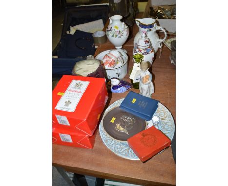 A collection of modern reproduction china: by Wedgwood, Coalport, Spode, etc., including: a Crown Derby paperweight in the fo