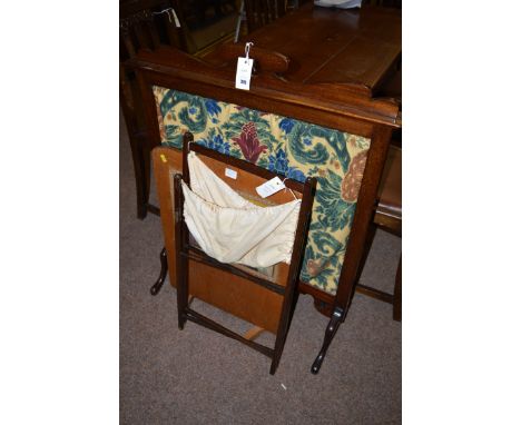 A mahogany framed firescreen; an oak firescreen; and a small folding stained wood stand for holding sewing work or knitting. 