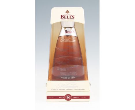 Bells 8 year old Millennium 2000 Edition Scotch Whisky. 40% 70cl. In box.