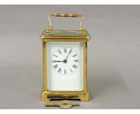 A French brass carriage clock, with non striking movement, 14cm high