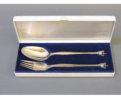 A Danish 'sterling' silver knife and fork, with crown terminals, in case, stamped DG (Dansk Guldindustri)