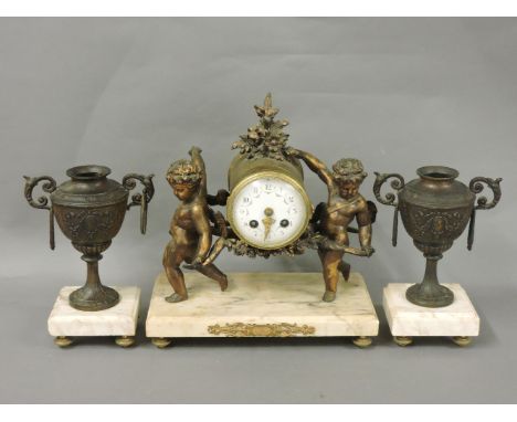 A 19th century French gilt spelter clock garniture, the drum movement striking the quarters, mounted on a pale marble plinth,