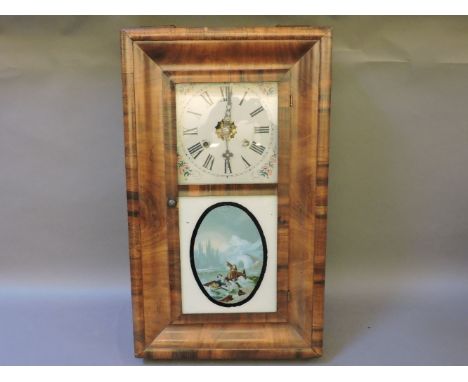 An American wall clock, with a mahogany case, and an unusual Arctic scene to the door, and a mahogany American wall clock, th