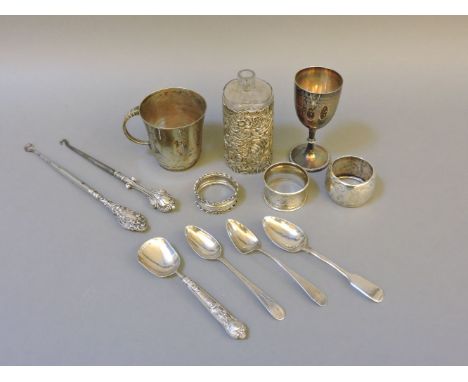 Silver and silver plated  items, two silver handled button hooks, three napkin rings, Georgian caddy spoon, etc