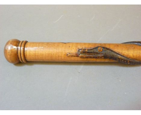 A 19th century walking stick, carved snake design