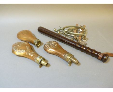A policeman's truncheon, three 19th century copper powder flasks, a pair of spurs, and a silver plated arrow