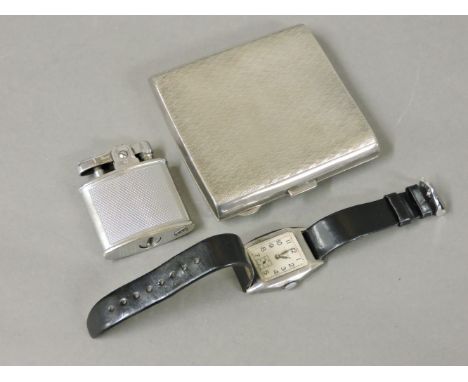 An early 20th century silver cased gentleman's wrist watch, by J W Benson, London, a silver cigarette case, and a Ronson stan