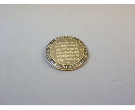 A 'Census Resisted' badge, produced by The Suffragette Movement, inscribed 'A census ... for Gt Britain shall be taken in the