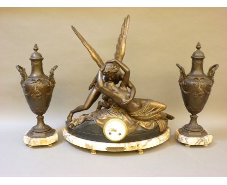 A late 19th century spelter clock garniture, titled ‘Amour et Psyche’
