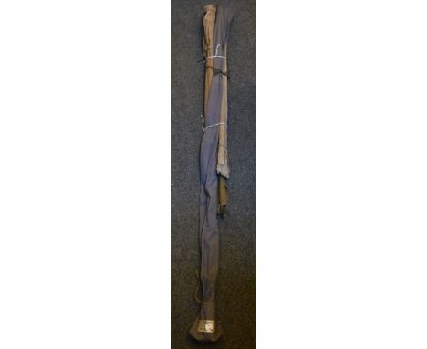 A collection of vintage fishing rods, and a box containing a collection of fishing accessories, including flies and floats