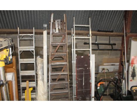 A Wickes Pro Deck aluminum folding ladder and a Youngman Pro Deck platform